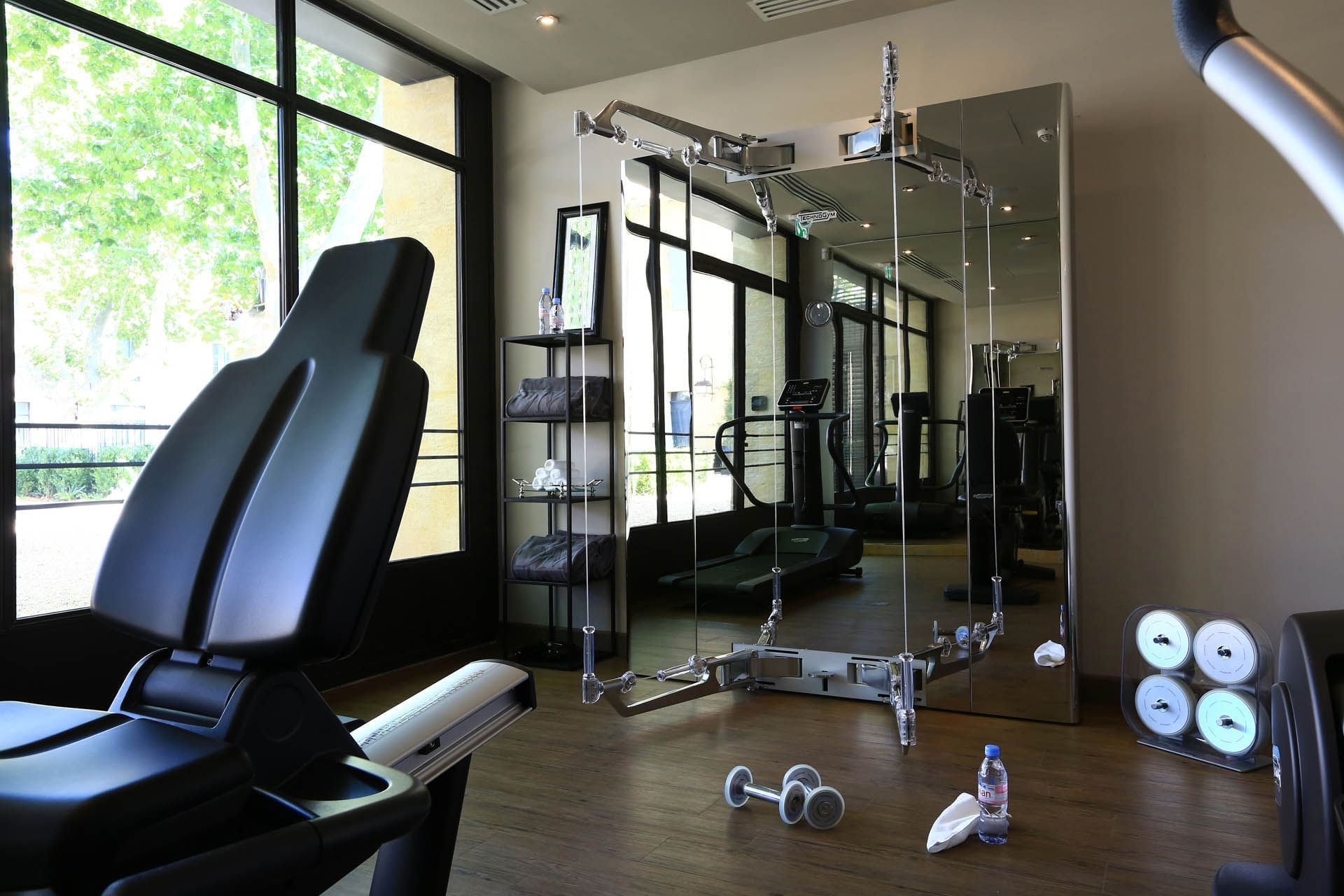 Exercise equipments in wellness center at Domaine de Manville
