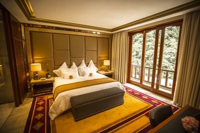 Imperial Suite with river view with a kings bed at Hotel Sumaq