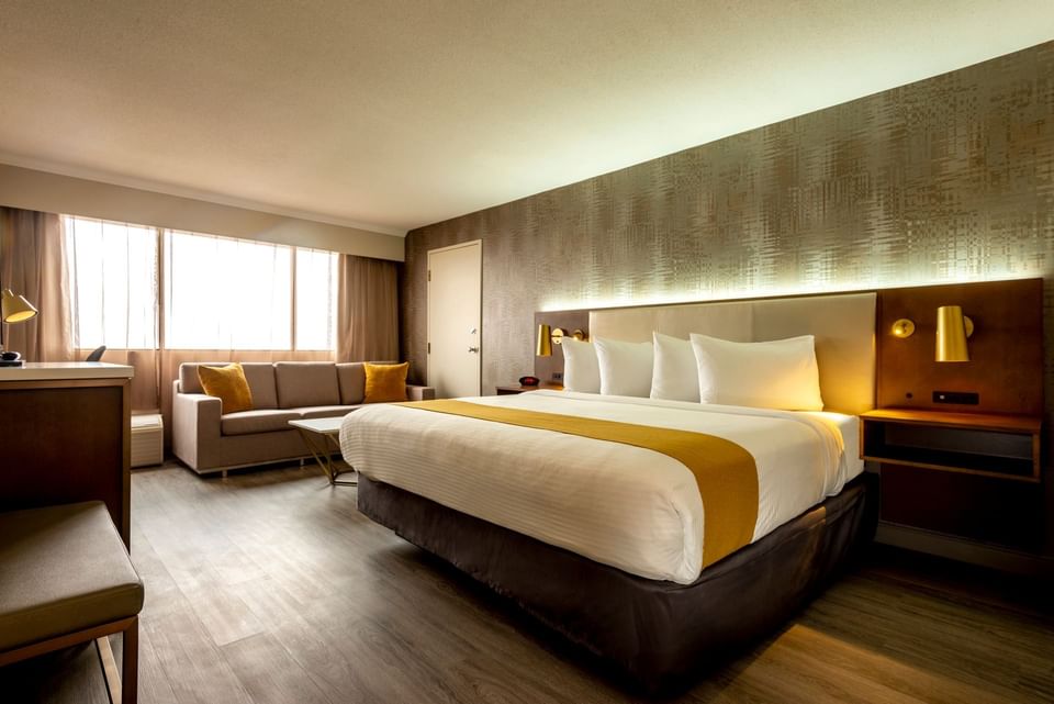 Bedroom arrangement in Gold Room at Atlantica Hotel Halifax