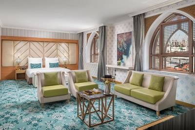 Living area with a TV in Executive Suite at Elaf Al Taqwa