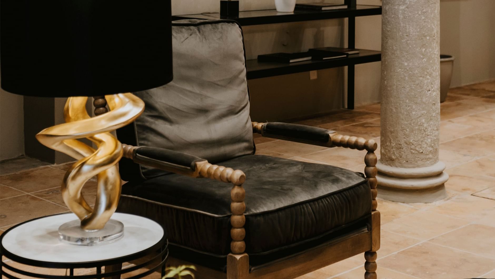 Chair, lamp in lobby, Dos Patios Queretaro Curamoria Collection