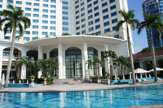 Swimming pool with the view of the hotel at Hanoi Daewoo Hotel