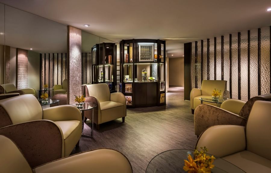 Comfortable lounge area in Fullerton Spa lobby at Fullerton Singapore