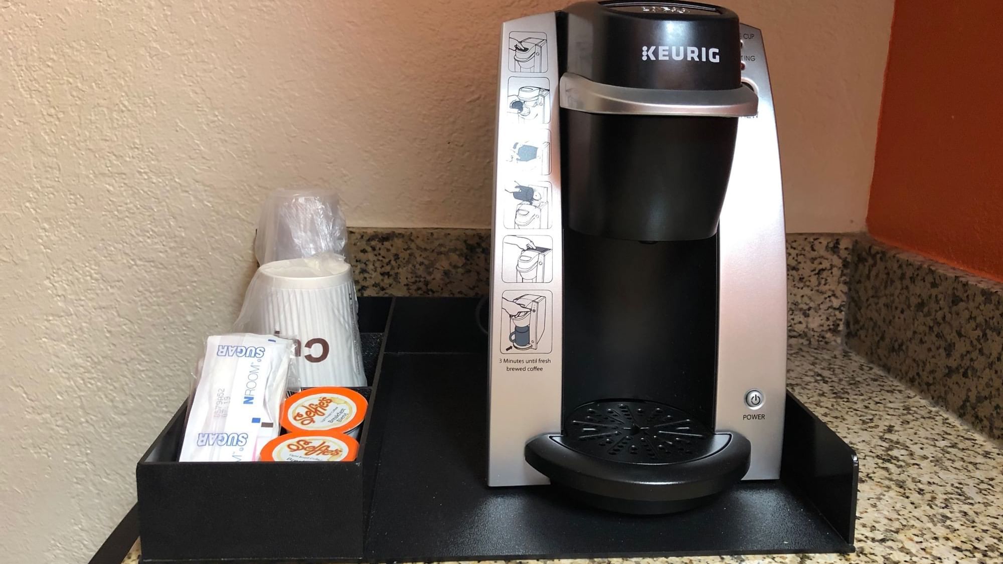Closeup of a coffee machine in The ADA suite at DOT Hotels