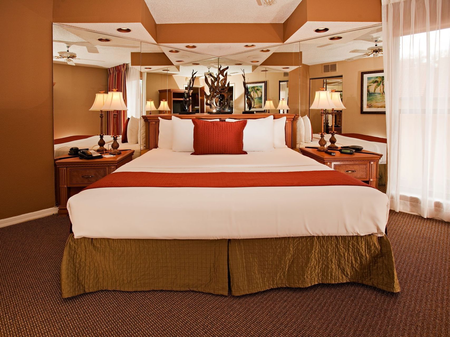 Large bed, One bedroom deluxe suite at Legacy Vacation Resorts
