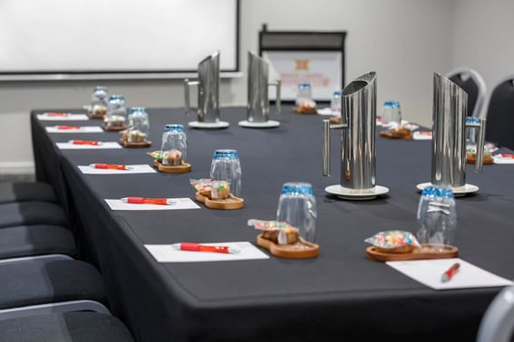 Boardroom table set-up in a Room at Hotel Grand Chancellor