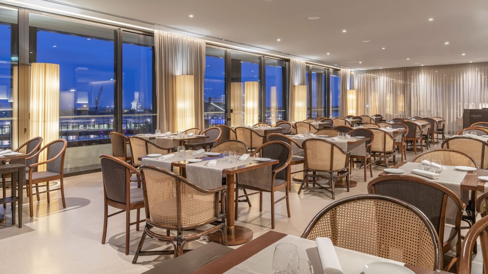 Dining tables set-up with a view in Balcony Restaurant at Grand Hotel Açores Atlântico