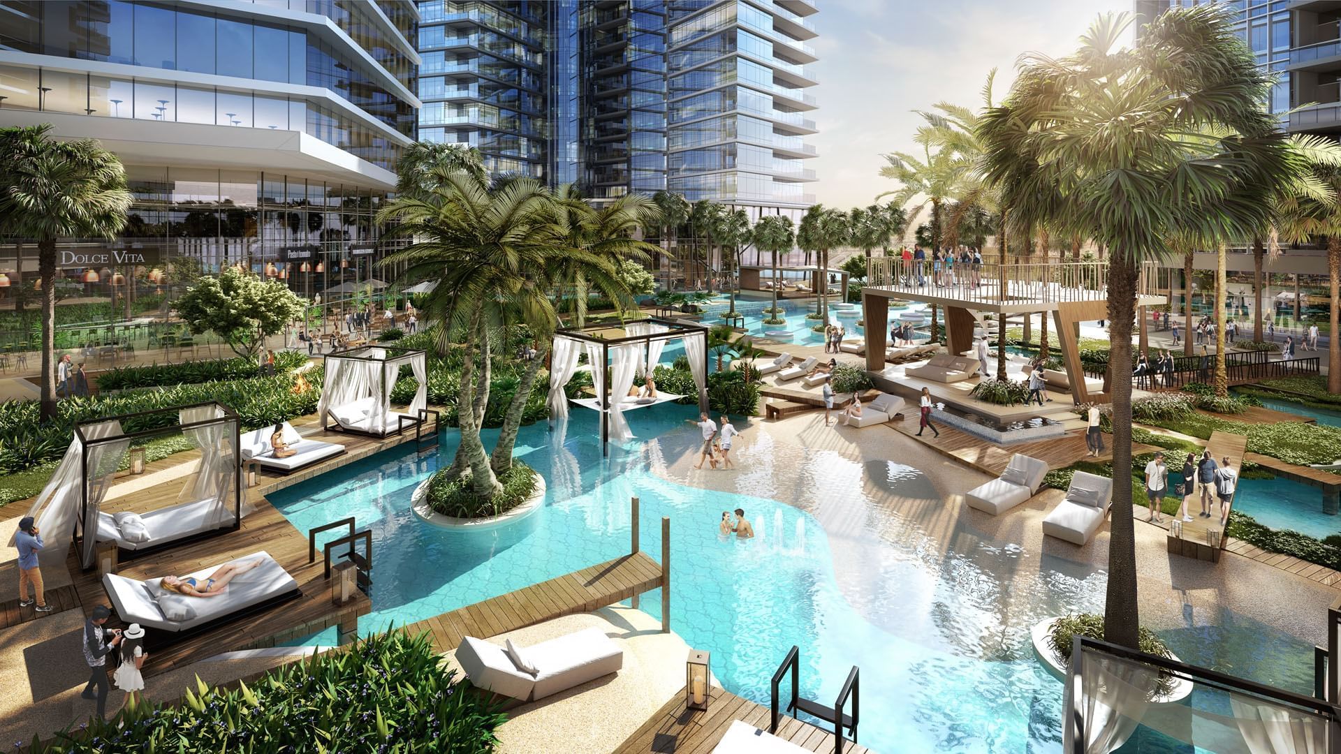 Sunbeds by the Temperature controlled outdoor swimming pool at Damac Maison Aykon City Hotel Apartments