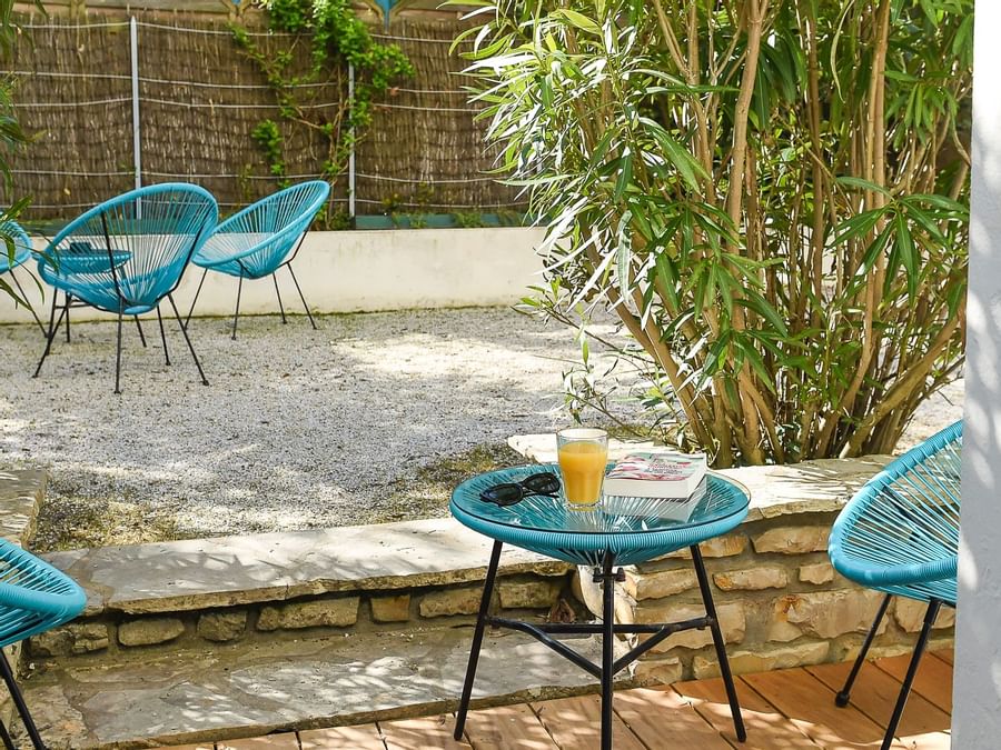Garden chairs in Le Villa West & Spa at The Originals Hotels