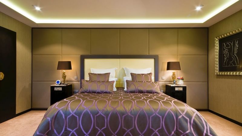Bed with nightstands in Grand Place Suite at Warwick Brussels