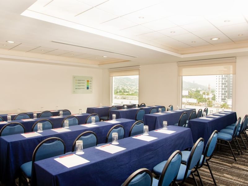 Meeting room table setup in the Salon D at Fiesta Inn Hotels