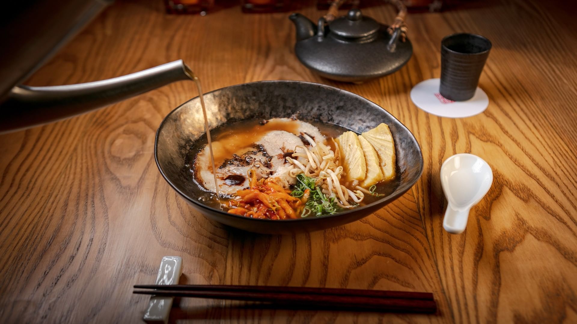 Hot ramen bowl featuring pork, and  bamboo shoots served in Morimoto  at Camino Real Polanco Mexico