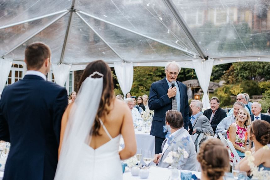 Man giving a speech in the wedding reception held at Alderbrook Resort & Spa
