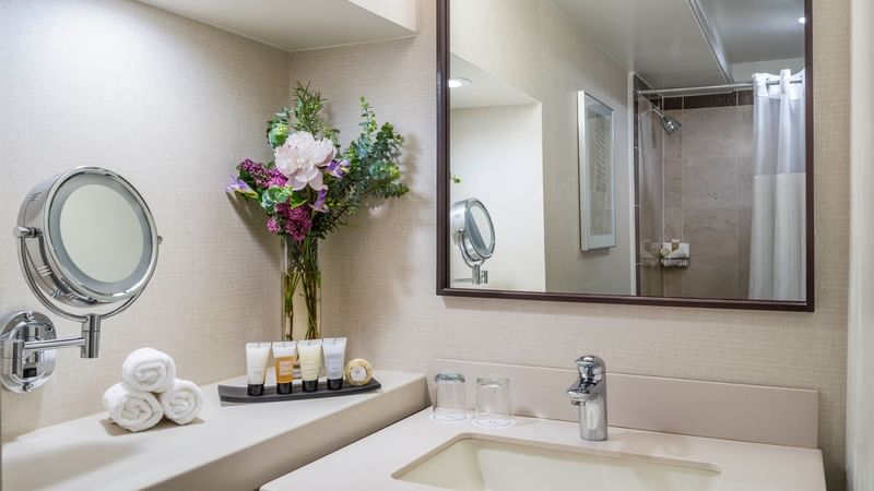 Bathroom vanity with towels in Premiere Suite at Warwick Denver