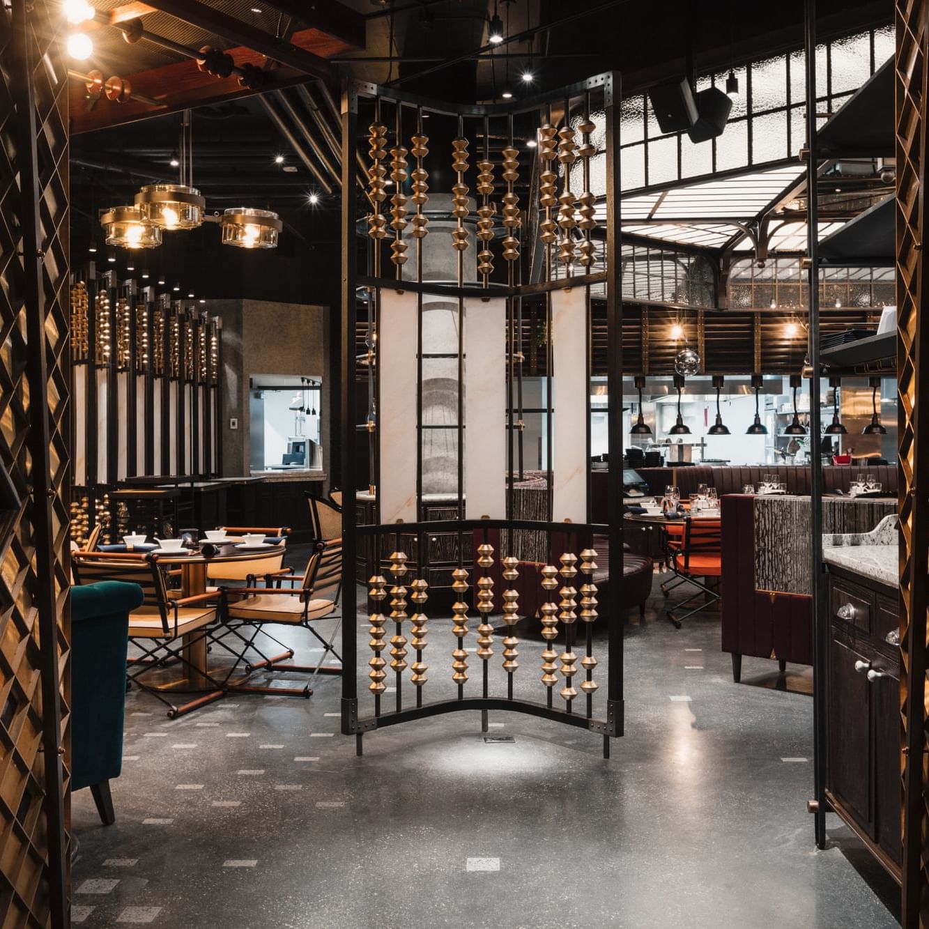 Elegant interior of the Mott 32 restaurant located at the Paradox Hotel Vancouver.