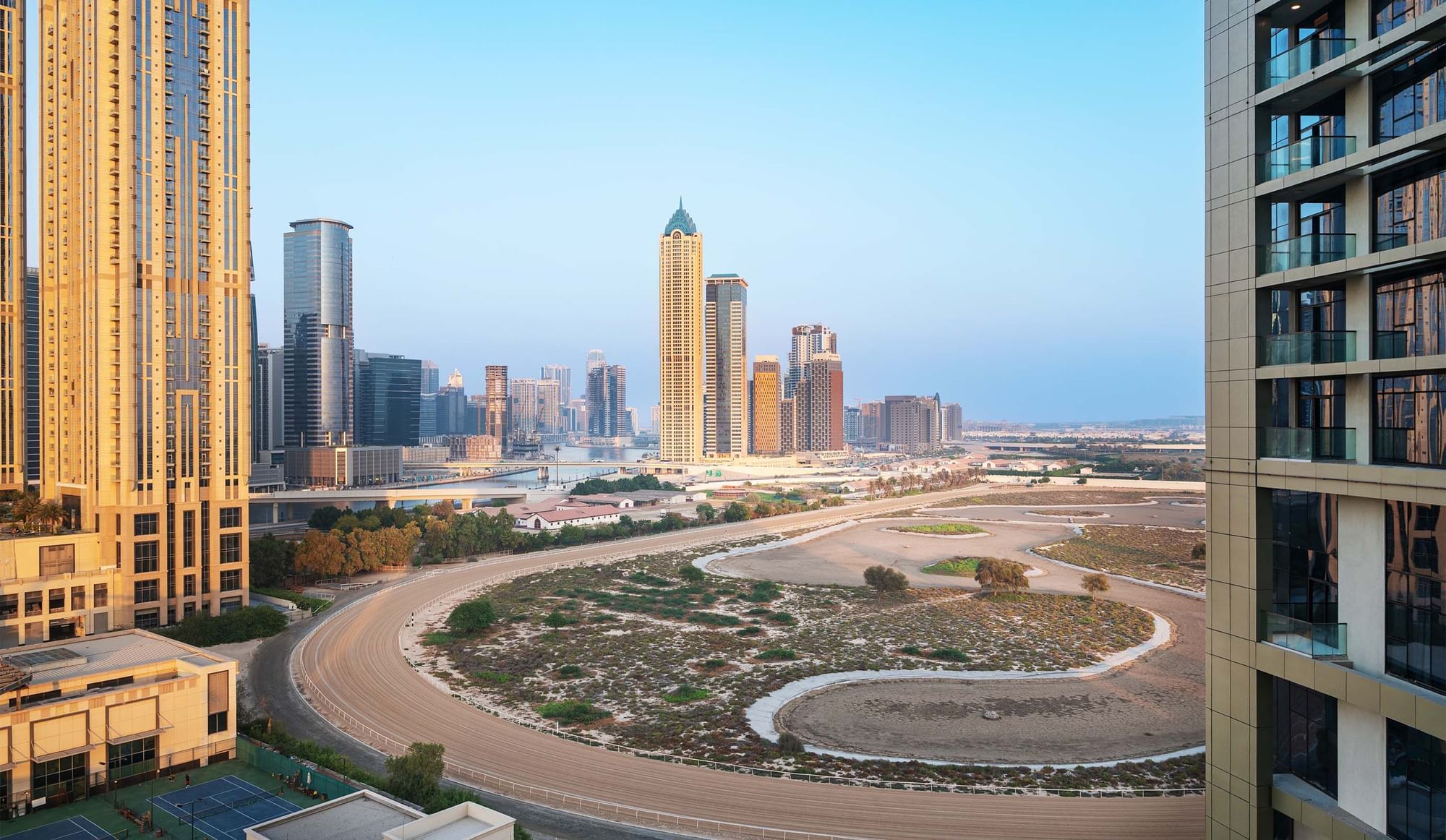 Distant view of Dubai's towering skyline near DAMAC Maison Aykon City