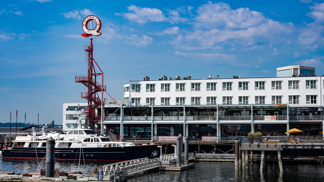 Docked yacht, Lonsdale Quay Sign and calm harbour view