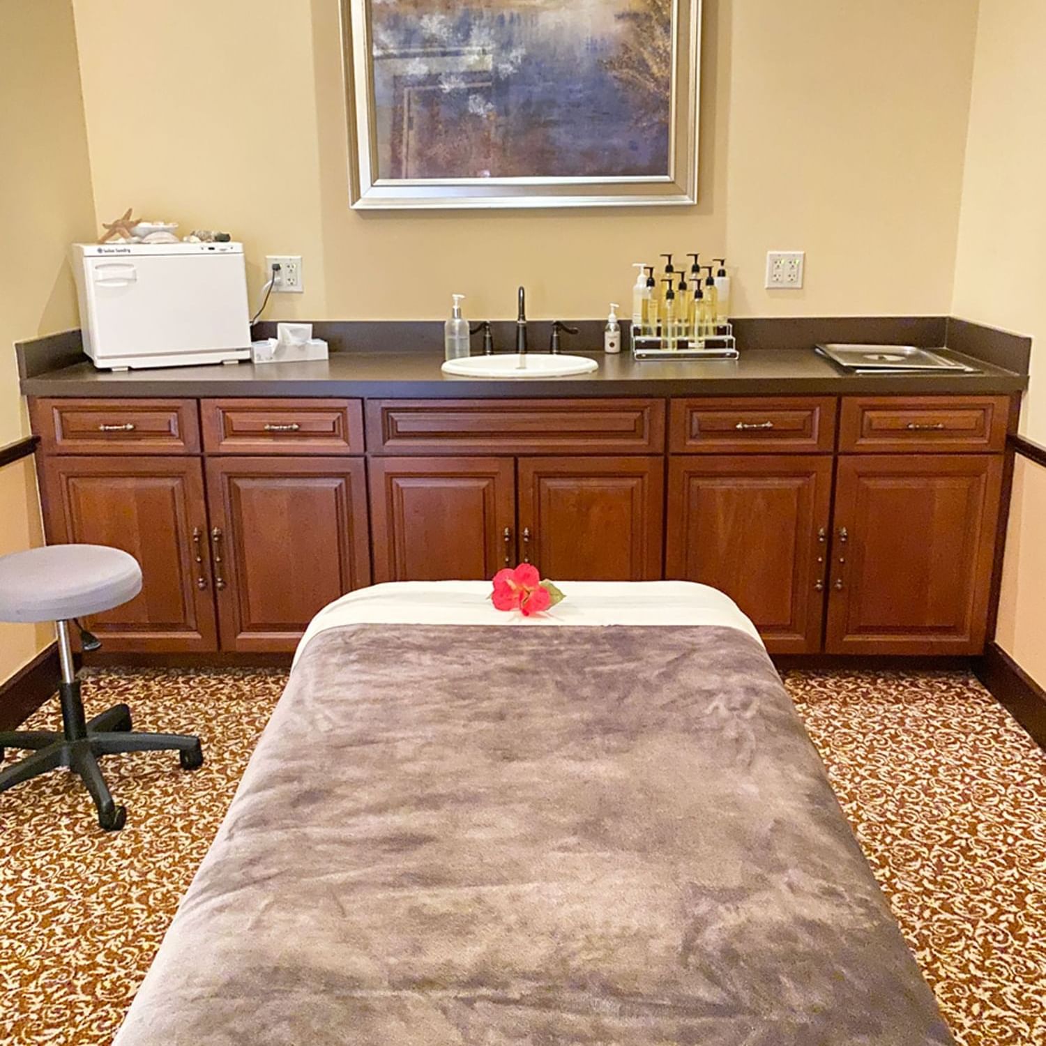 Massage bed and vanity area in reflection Spa and Salon at Lake Buena Vista Resort Village & Spa