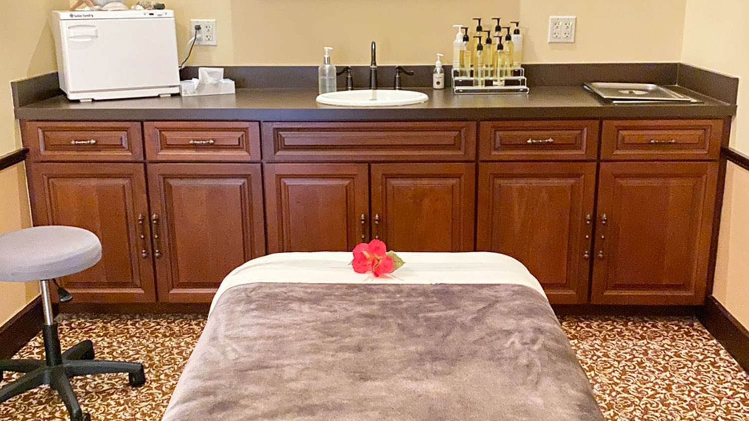 Massage bed and vanity area in reflection Spa and Salon at Lake Buena Vista Resort Village & Spa