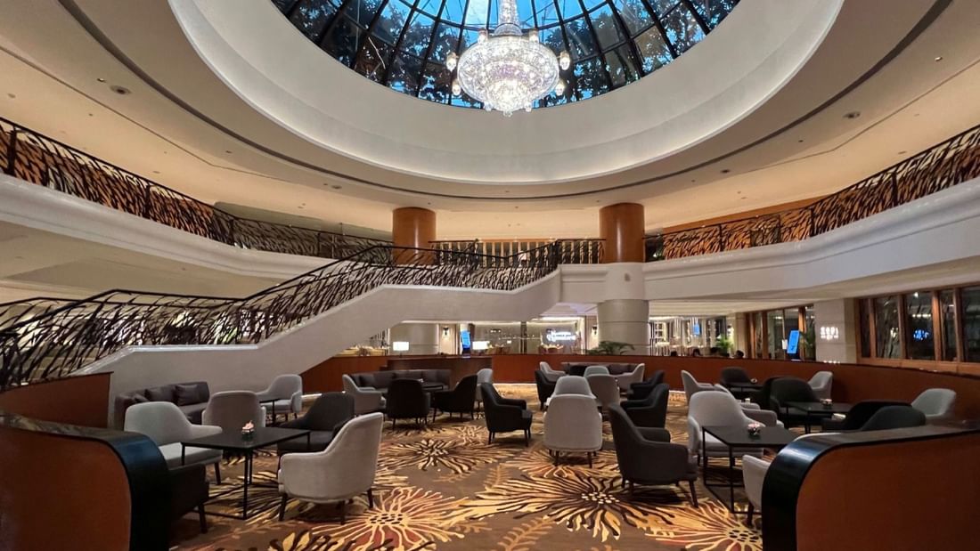 Grand chandelier and spiral staircase in Atrium Lounge at Sunway Putra Hotel