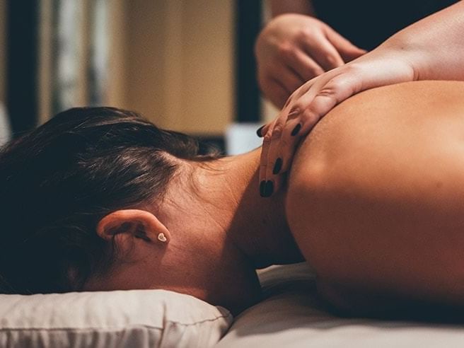 Lady having a massage in Sun Tree Spa at Temple Gardens Hotel & Spa