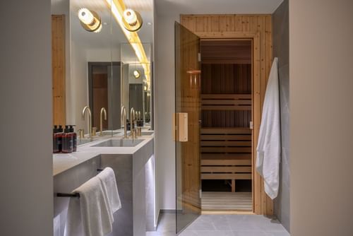 Bathroom vanity area & sauna at Almanac X Alcron Prague, Fitness Center Prague
