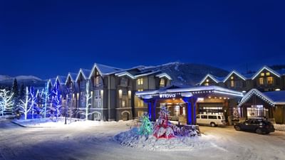 Exterior view of the hotel in winter at Aava Whistler Hotel