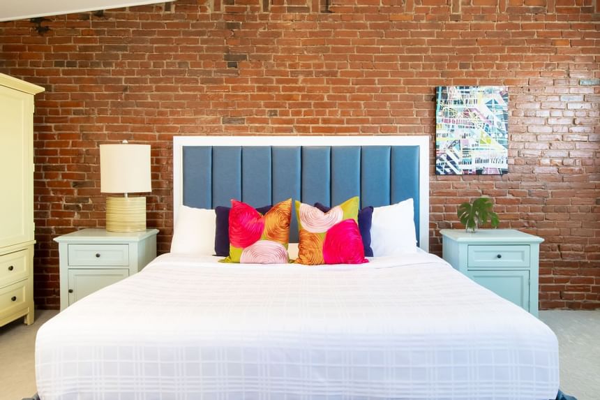 Comfy bed in Premiere Loft Town & Country at Retro Suites