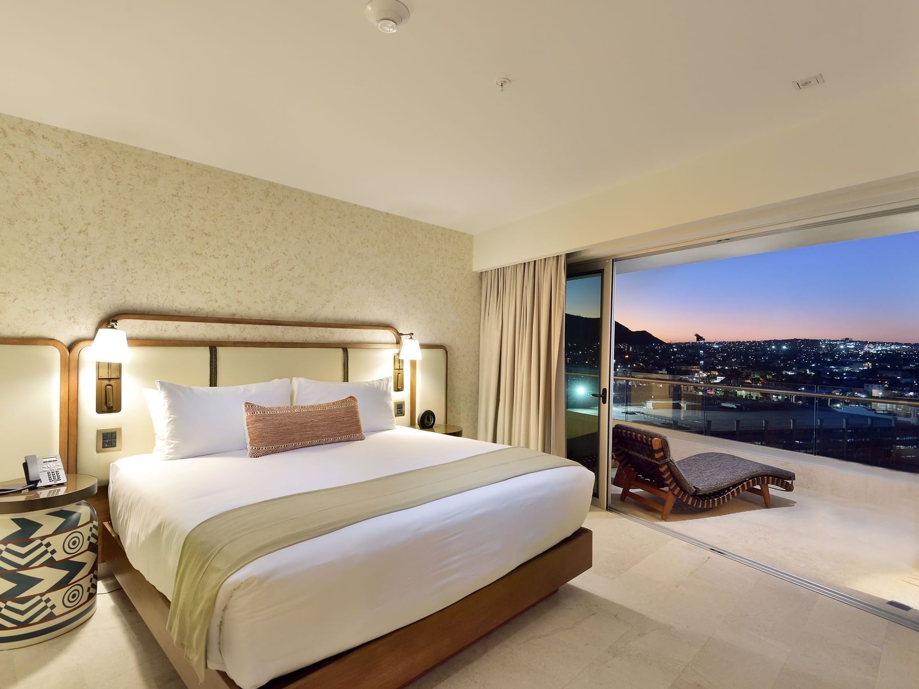King bed in Sunset Suite Bedroom at Cabo villas beach resort