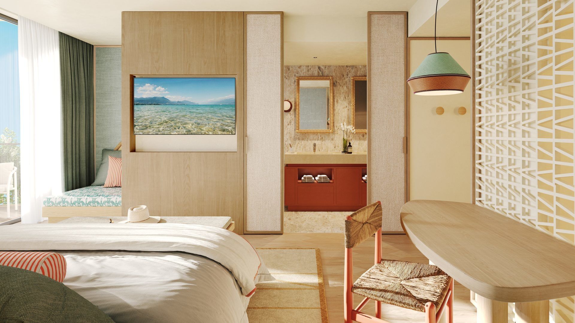 Modern hotel room with bed, TV, bathroom, and wooden table with chair.
