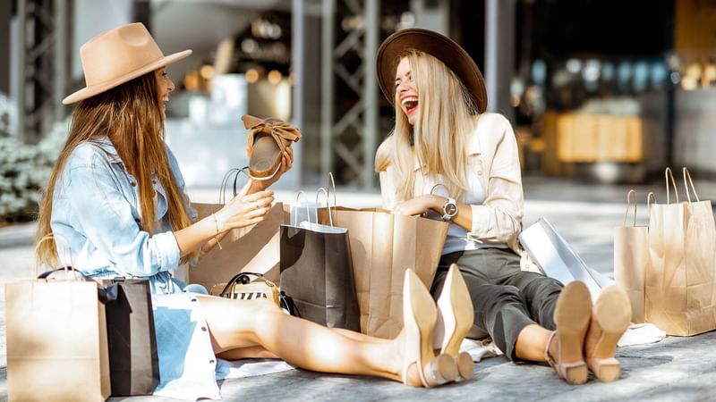 Close-up of girls shopping at Warwick Melrose Dallas