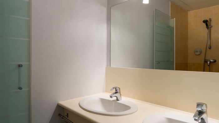 Bathroom vanity in bedrooms at Hotel Pic Epeiche