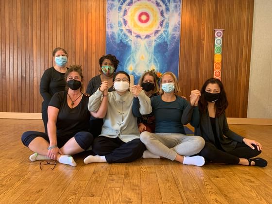 A group of people in Healing Chakra Retreat at Honor’s Haven Retreat