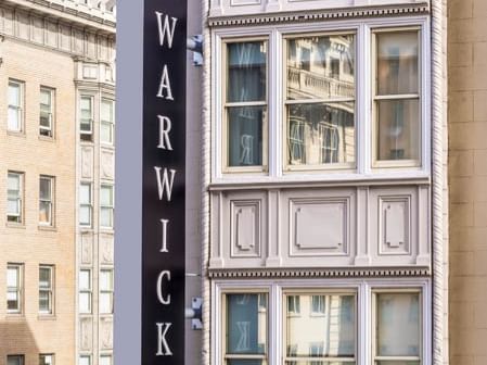 Exterior view of Warwick San Francisco with the signboard