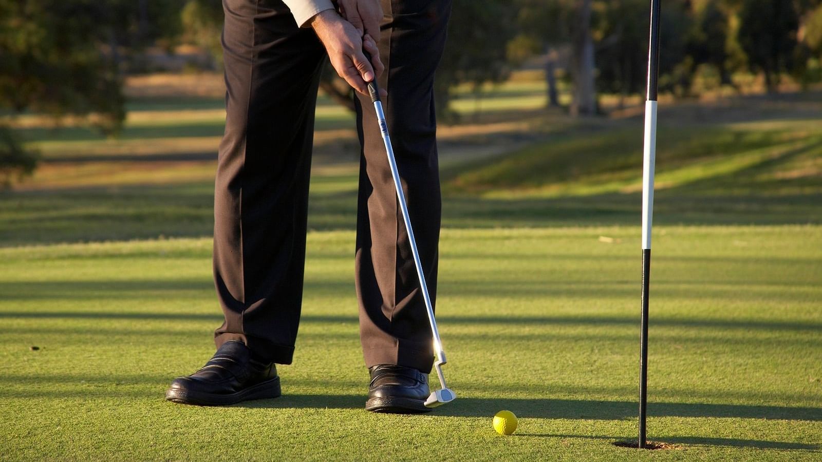 Man playing golf on a golf course near Novotel Barossa Valley