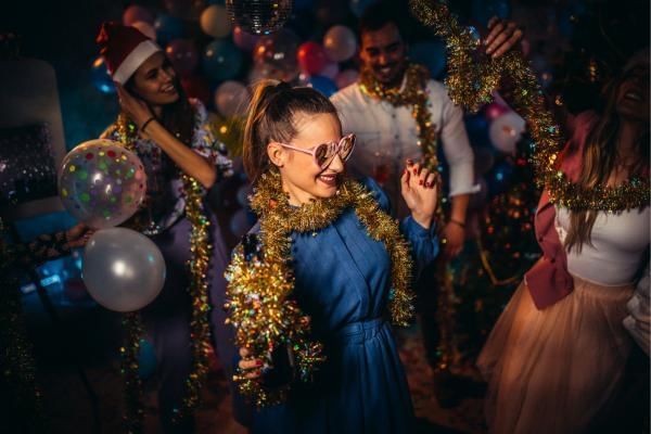 Everyone dancing to DJ, a great Christmas party entertainment idea