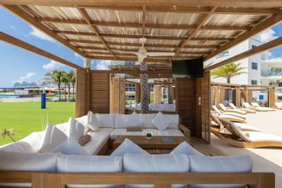 Pool cabana with sofas, The Morgan Resort Spa Village