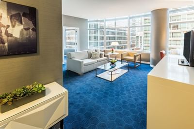 Interior of a living room in One Bedroom Suite at Kinzie Hotel