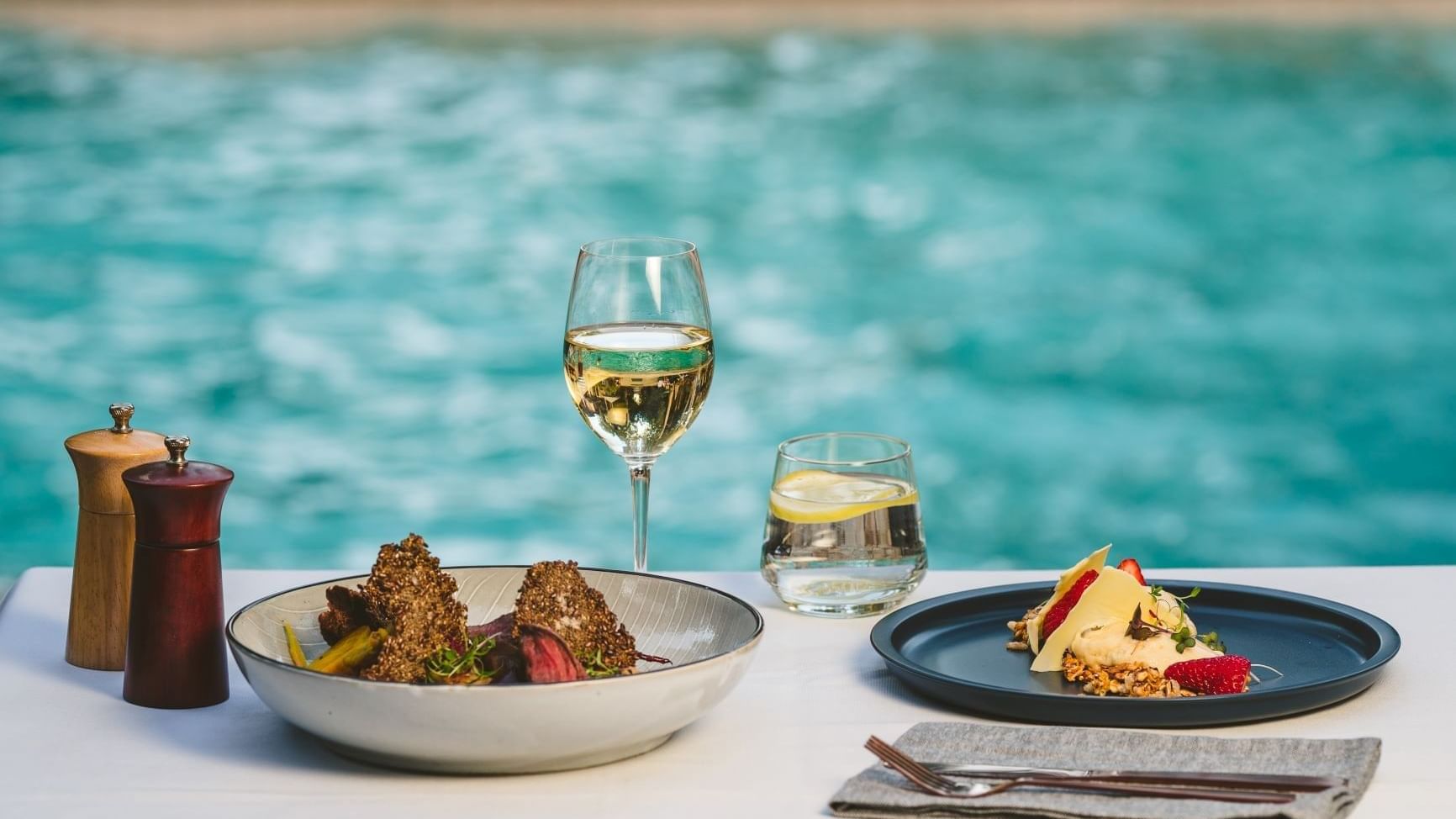 Enjoying Pool with food at Pullman Palm Cove Sea Temple Resort & Spa