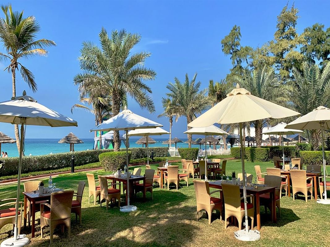Outdoor dining area in Beach Brunch In Zanzibar at Ajman Hotel
