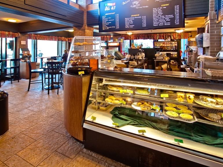 Miss Margaret’s Cafe with a counter and freshly baked goods at Harrison Hot Springs Resort