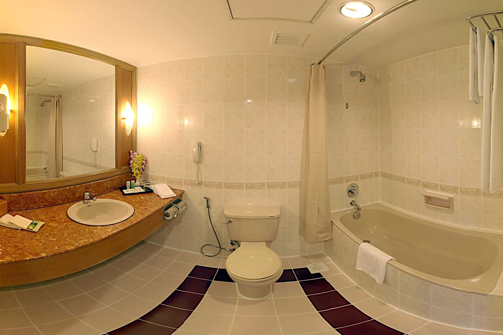 Bathroom with a bathtub in Deluxe Room at Sunway Hotel Phnom Penh