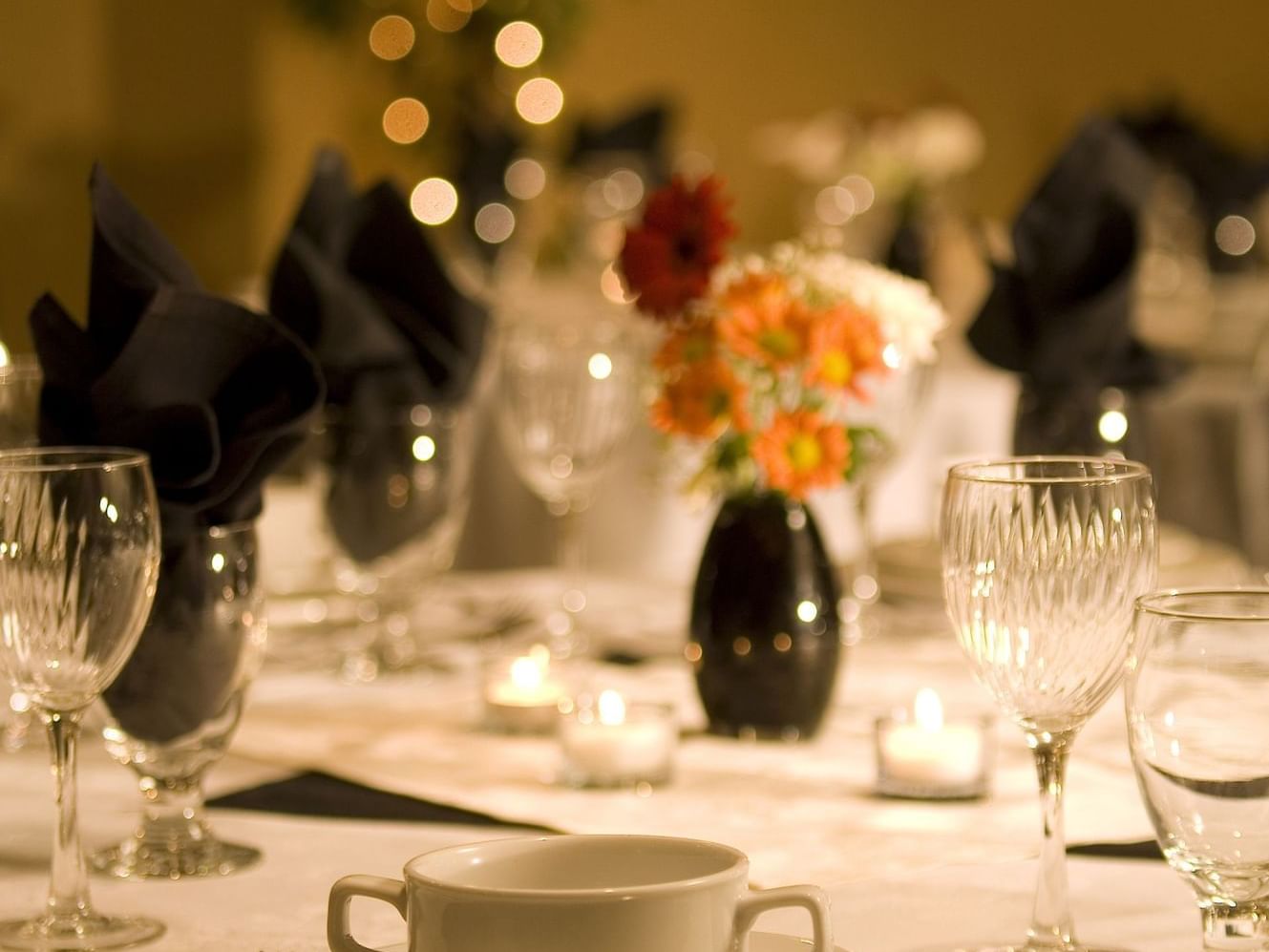 Close-up of table arrangement in Ballroom at Merit Hotel & Suites