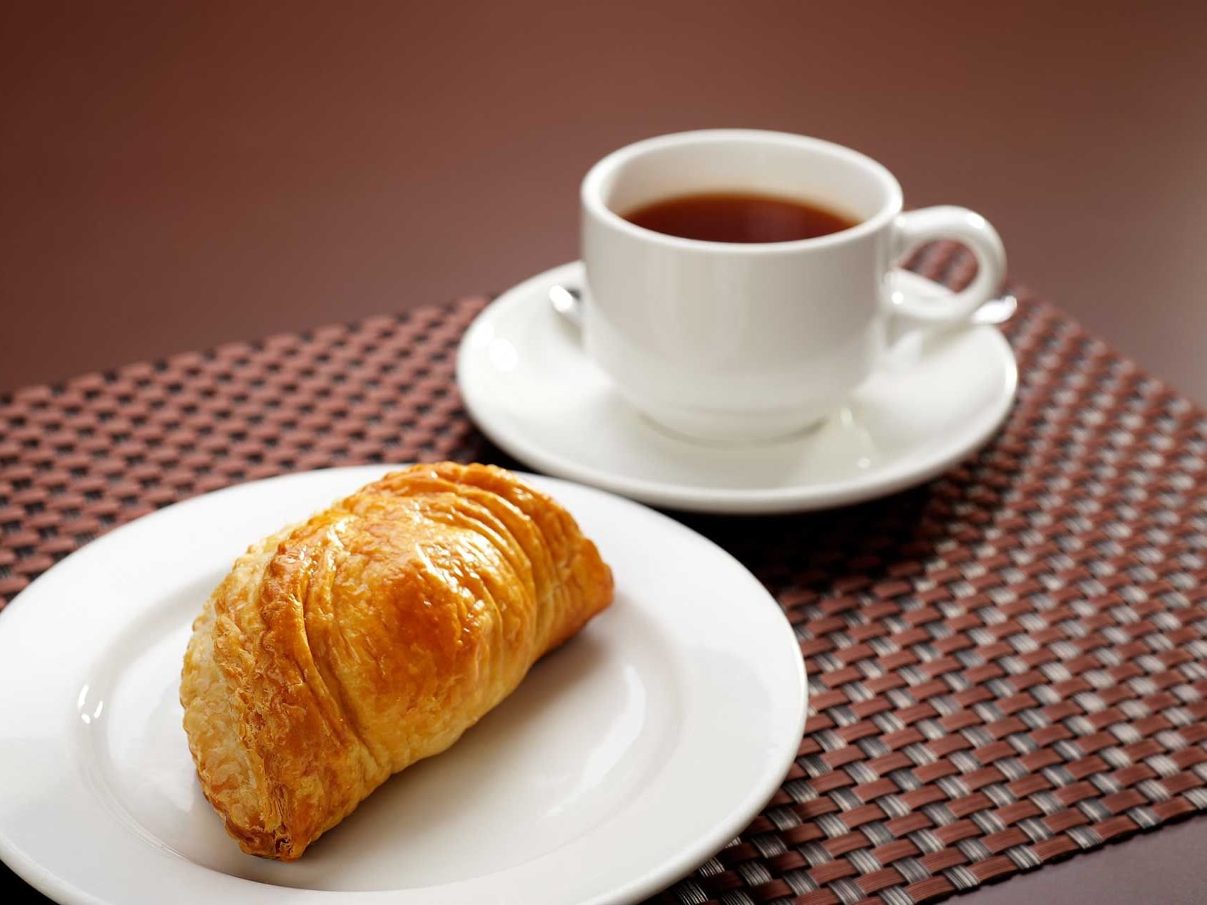 Close-up of tea & puff served at York Hotel Singapore