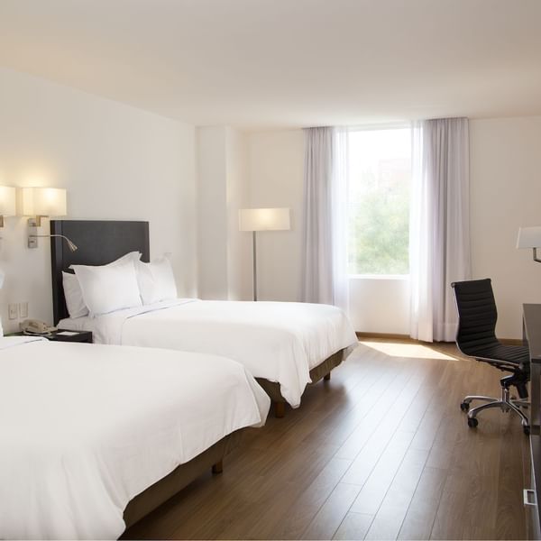 Two double beds in Superior Room at Fiesta Inn