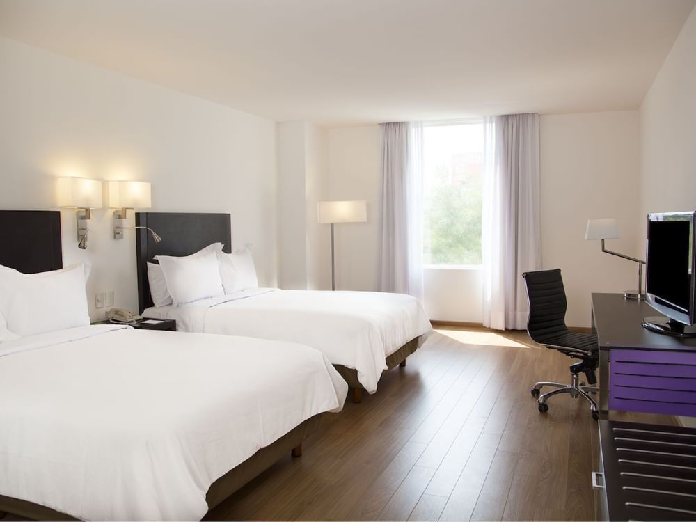 Two double beds in Superior Room at Fiesta Inn