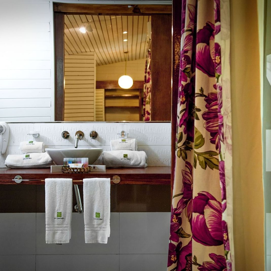Bathroom vanity in a suite at La Cantera Lodge De Selva