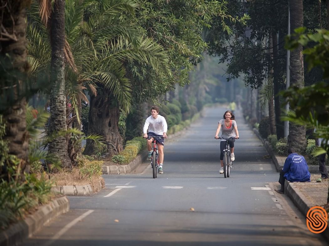 A Couple on a bike ride near Lake Kivu Serena Hotel