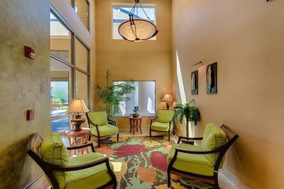 Comfortable Green Sofa in a Room at Triple Play Resort Hotel