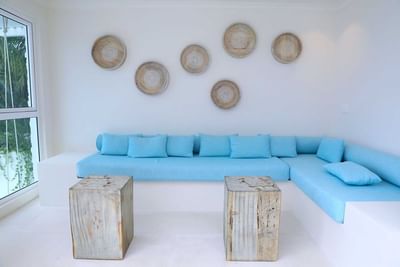 Lounge area with round shaped wall hangings at Costa Rica
